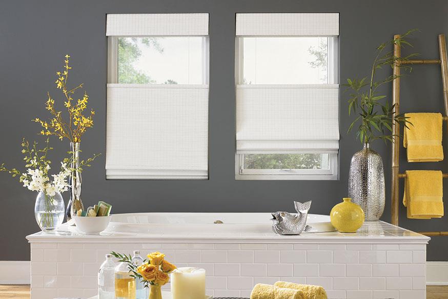 Top down, bottom up controlled white shades in a Spring decorated bathroom.