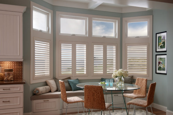 White Plantation Shutters In Beach Themed Dining Room